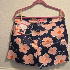 Isaac Mizrahi size 14 brand new (with tags) shorts. Color is a very dark blue.